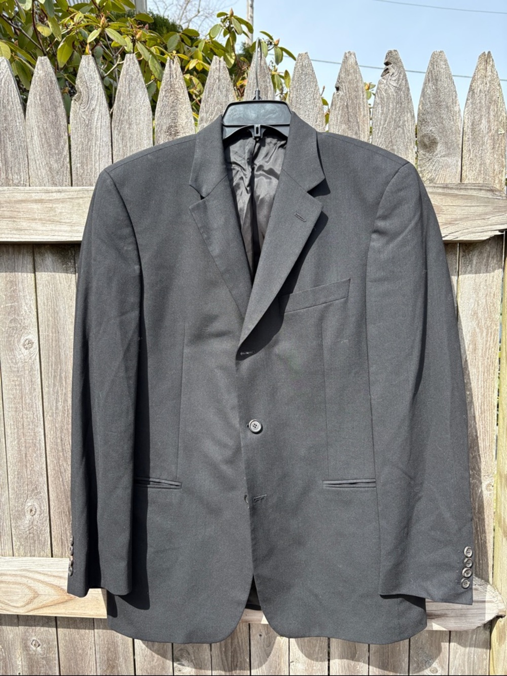 Hugo Boss 40R black wool blazer.
